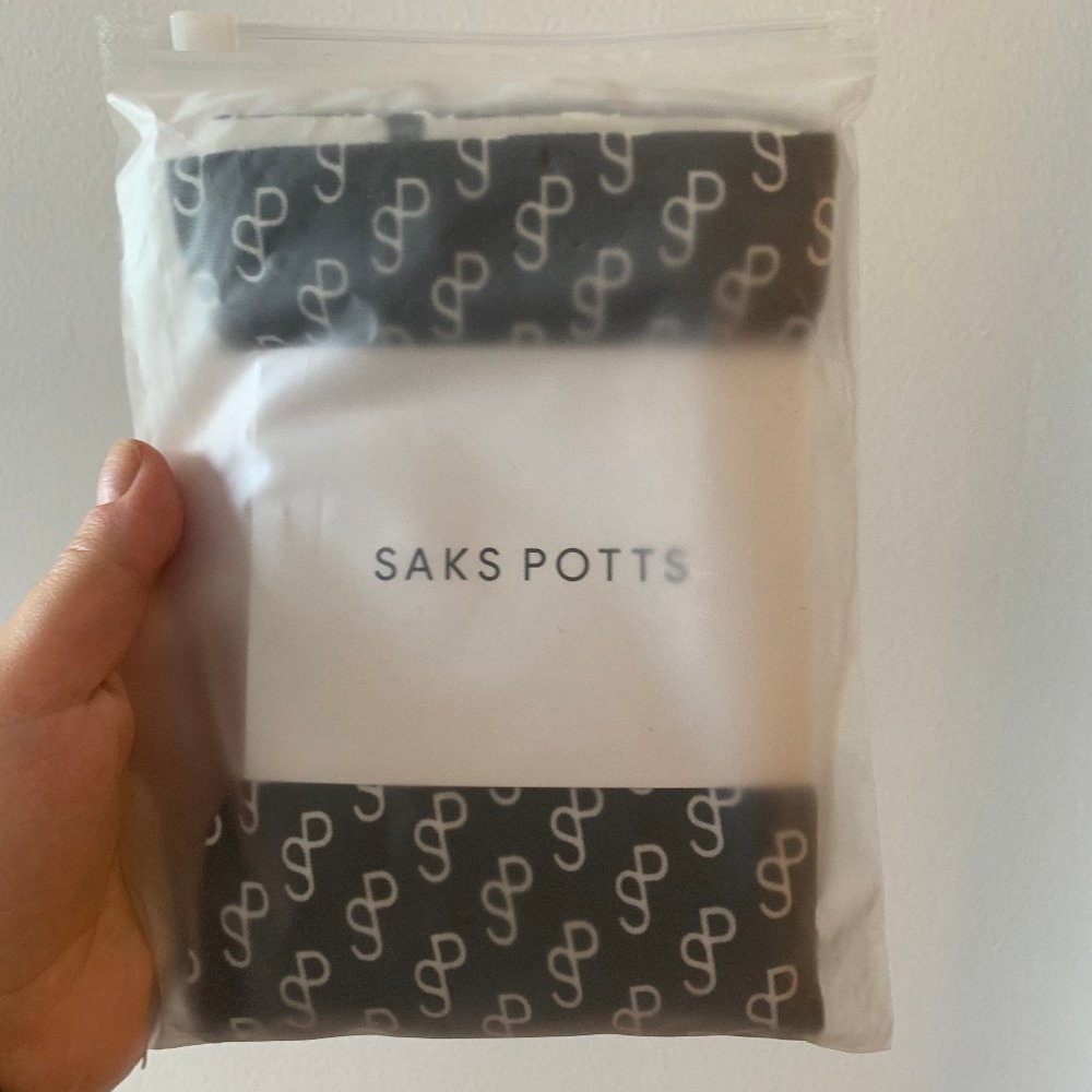 Saks Potts logo tights NWT